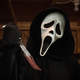 Ghostface with a bloody knife.
